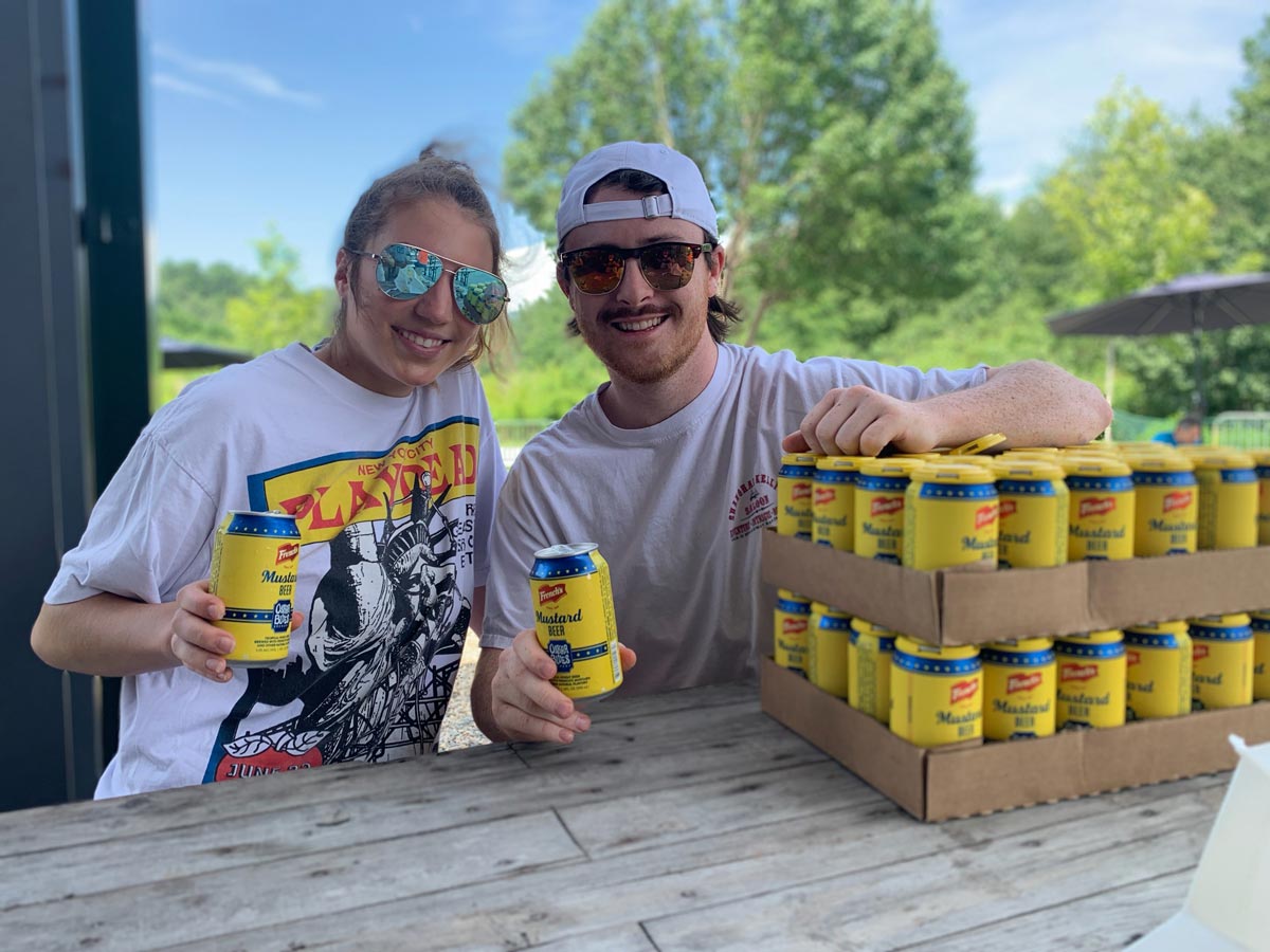 Two people with French's Mustard beer